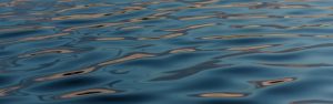 Surface of body of water with ripples