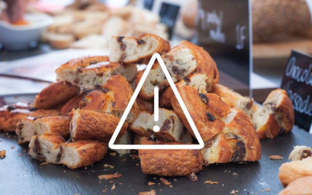 Showing an alert symbol for gluten over an image of food